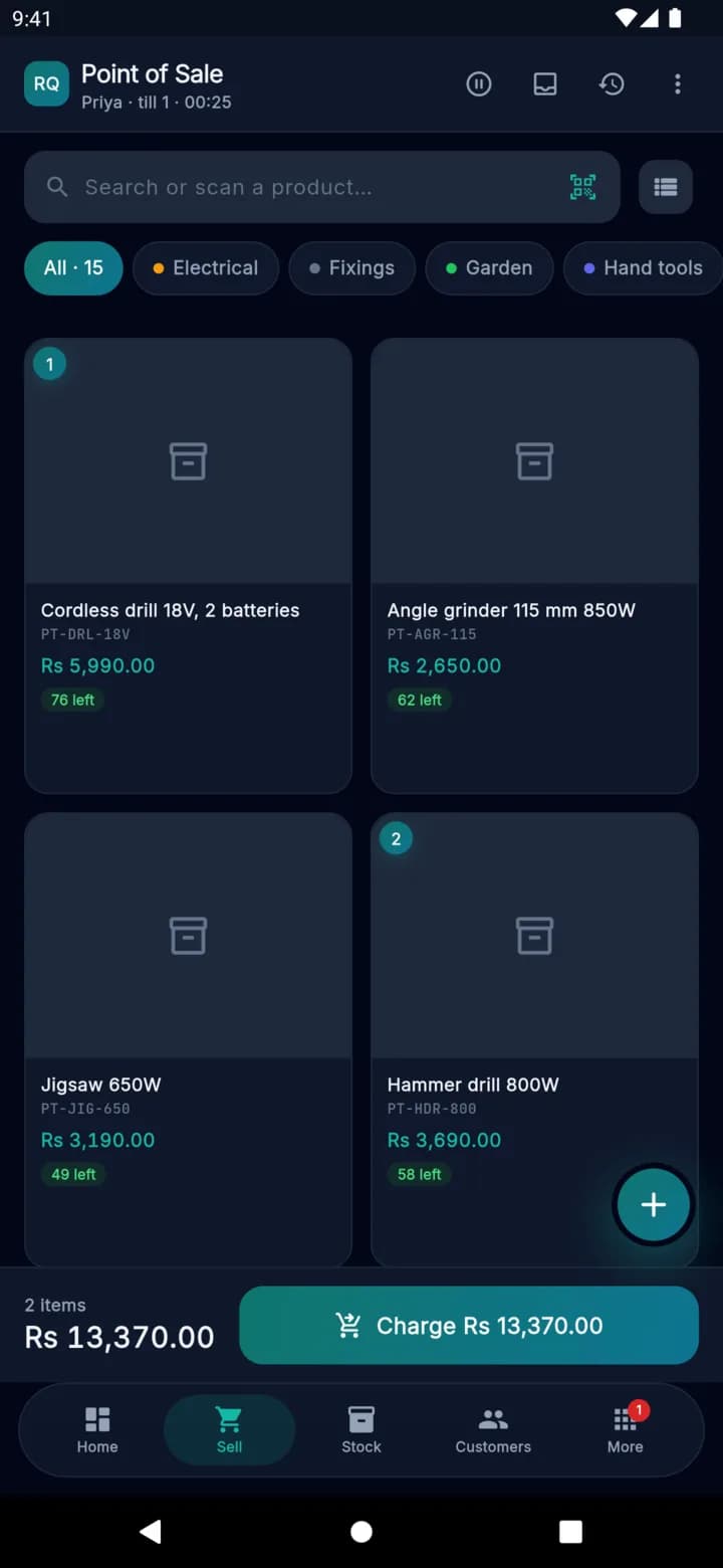 The till on the phone: a cordless drill and two hammer drills in the basket, Rs 13,370 to charge, with the catalogue filtered by category and a barcode scanner in the search field.