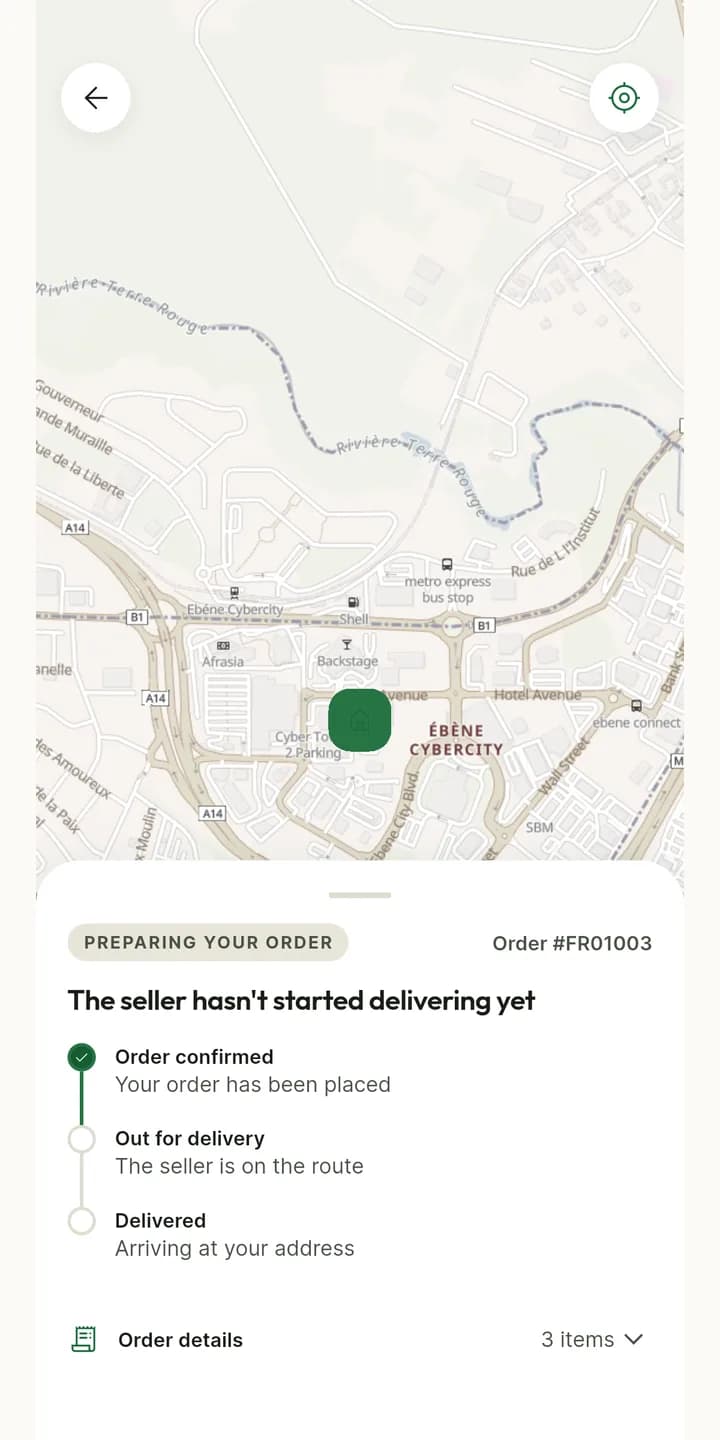 Order FR01003 on a map of Ébène Cybercity with the delivery address pinned, and a three-step timeline — confirmed, out for delivery, delivered — showing the seller has not set off yet.