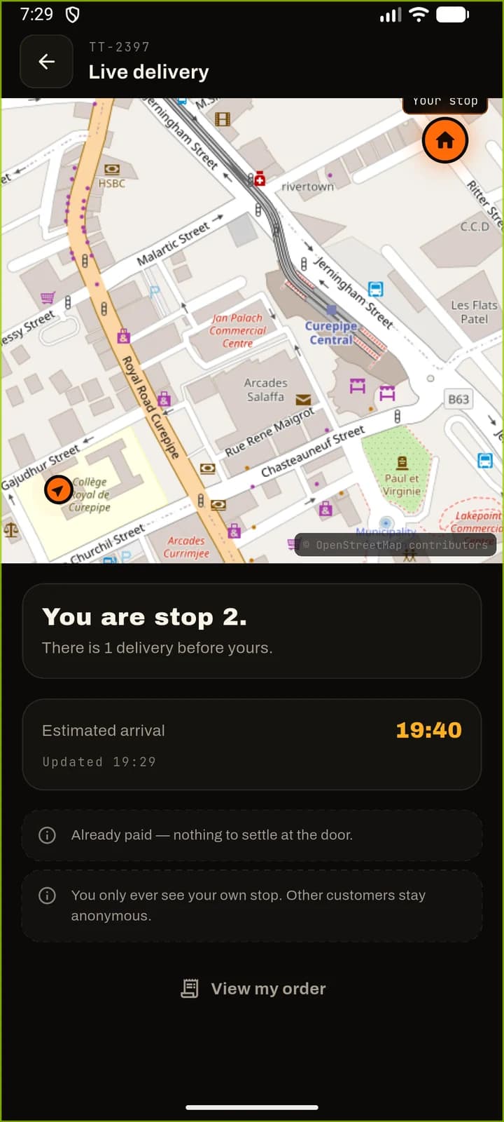 Live delivery for order TT-2397 on a map of Curepipe: the courier’s approximate position, the customer’s own stop pinned, “you are stop 2, there is 1 delivery before yours”, an estimated arrival of 19:40, and a note that other customers stay anonymous.